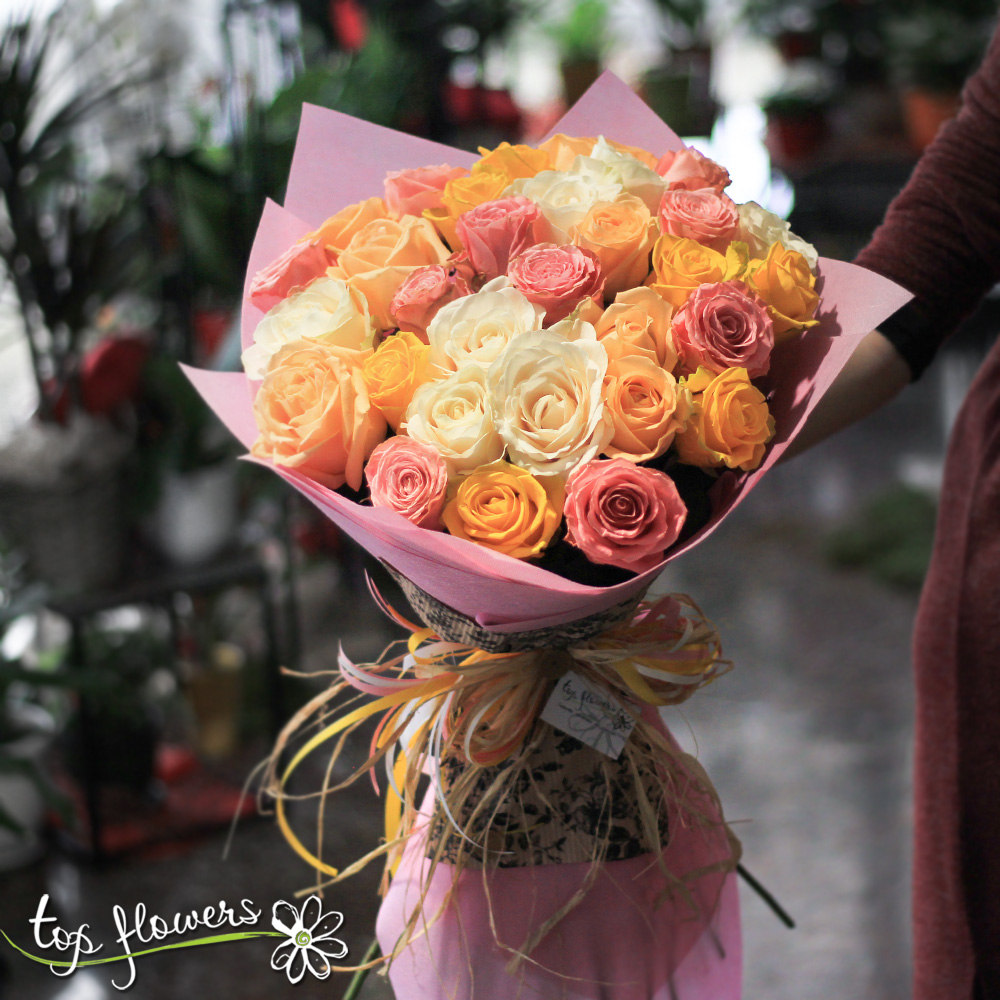 Delicate bouquet of 31 exquisite multicolored roses. Delivery in the ...