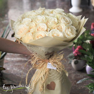 Round bouquet of 31 white roses