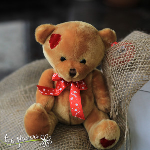 Teddy bear with red ribbon Brown | 20 cm.