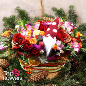 Festive basket with bright flowers and greenery – Top-Flowers