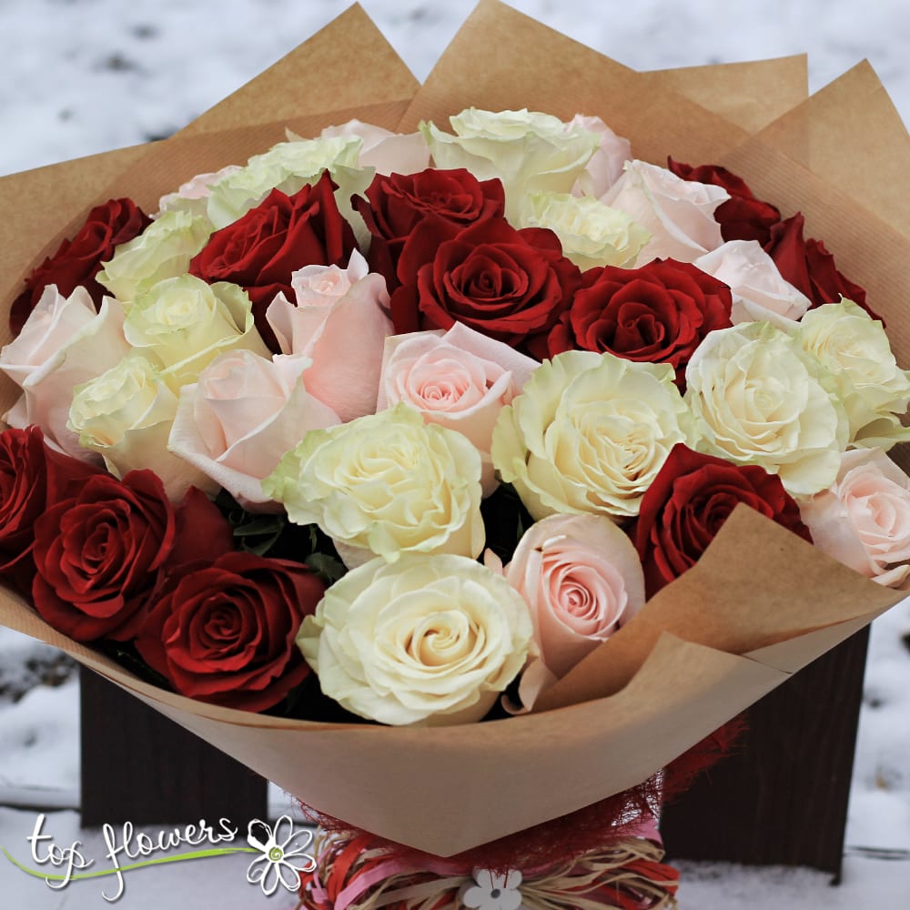 Round bouquet of 31 Red, White and Pink Roses