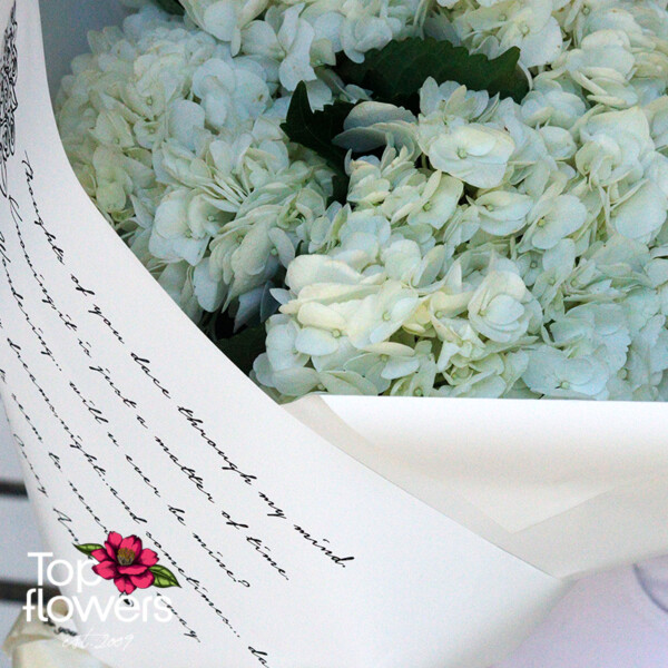 Wrapping of the White Magic bouquet with ribbon and elegant "Just for you" label
