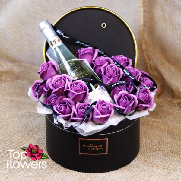 Elegant gift set with soap roses and white wine