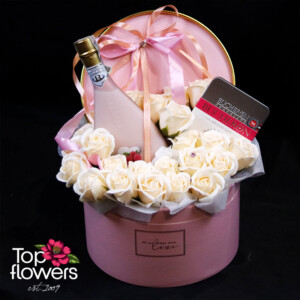 Box with cream soap roses, liqueur, and chocolate