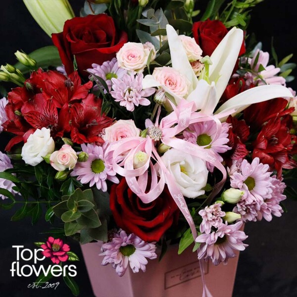 Arrangement “Romantic Symphony” with roses and lily
