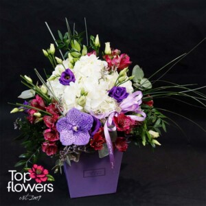 Elegant composition “Elmira” with ribbon and purple blooms