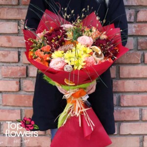 Honey Breeze bouquet with roses and carnations