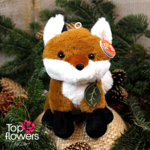 Plush fox 20 cm among Christmas decorations