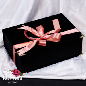Closed black gift box with ribbon from the Resonance series