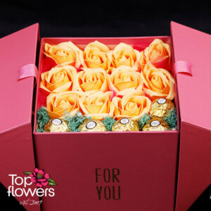 Detail of soap roses and Ferrero Rocher in a box – stylish floral compliment