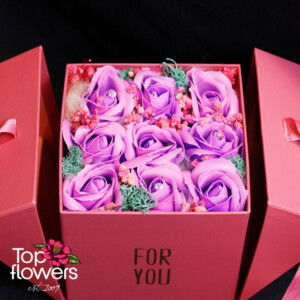 Lilac soap roses with gypsophila and Scandinavian moss – stylish gift from a flower shop