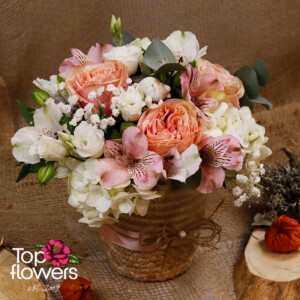 Angel’s Touch arrangement with roses and hydrangea in a basket