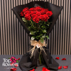 Bouquet red roses in black wrapping