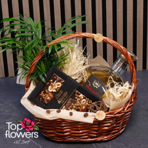 Chamaedorea in a pot as a green accent in the Rubaiyat gift basket