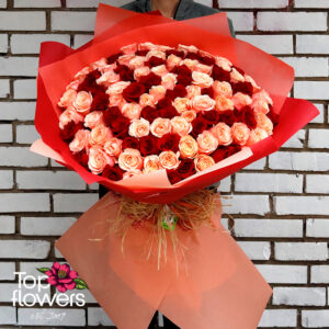 101 red and peach roses in a large luxury bouquet